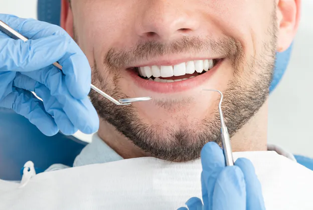 Dlaczego regularne wizyty u stomatologa są kluczem do Twojego zdrowia